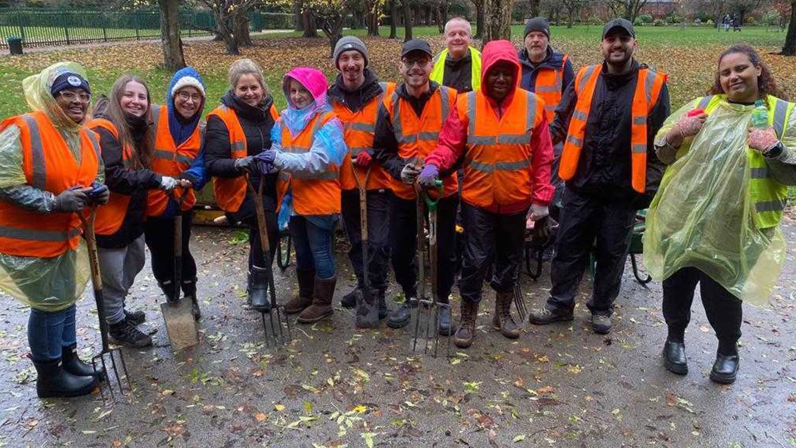 Autotrader volunteers planting trees to help rewild a golf course at Frodsham Woods